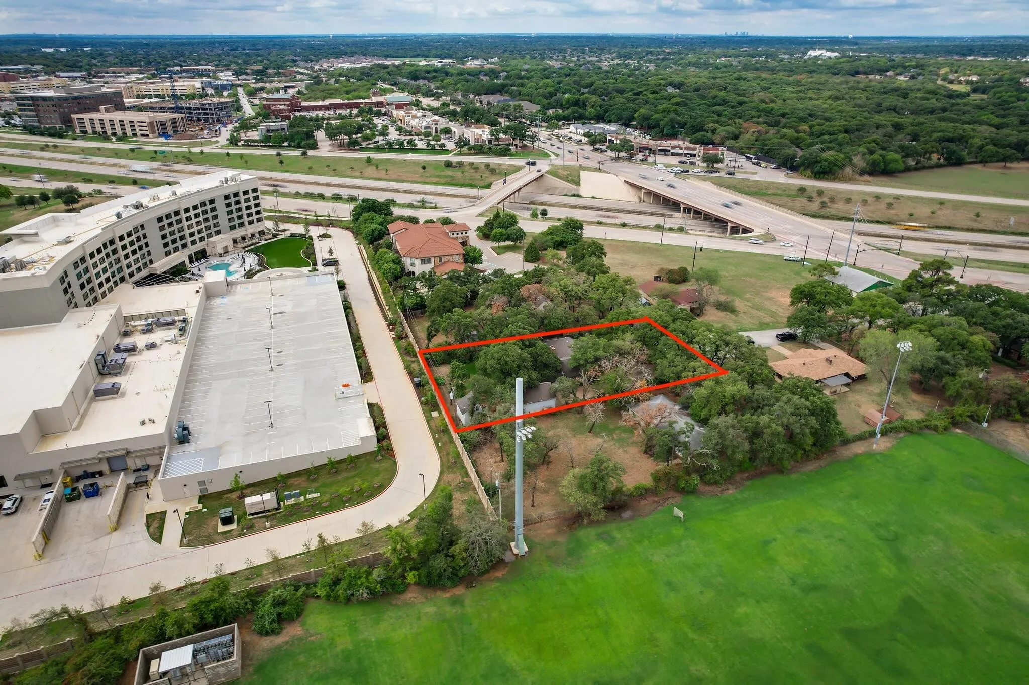 Aerial view of Casey Court property in Southlake TX showing shared boundary with Westin Dallas Southlake hotel on SH-114 corridor